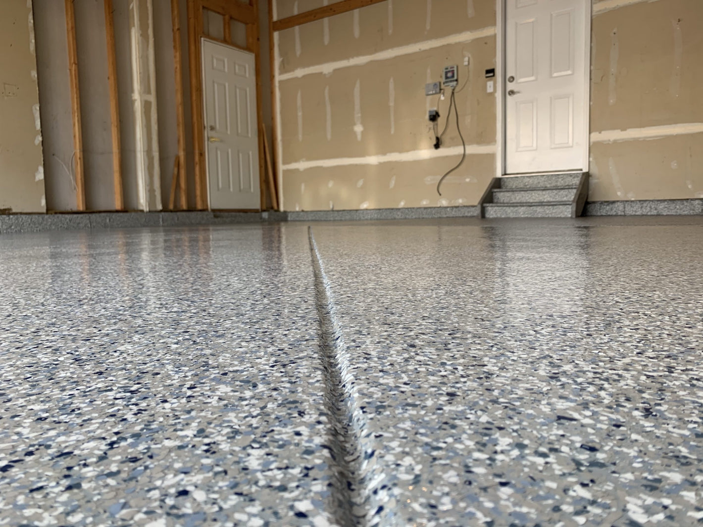 Gray epoxy garage flooring in Minnesota